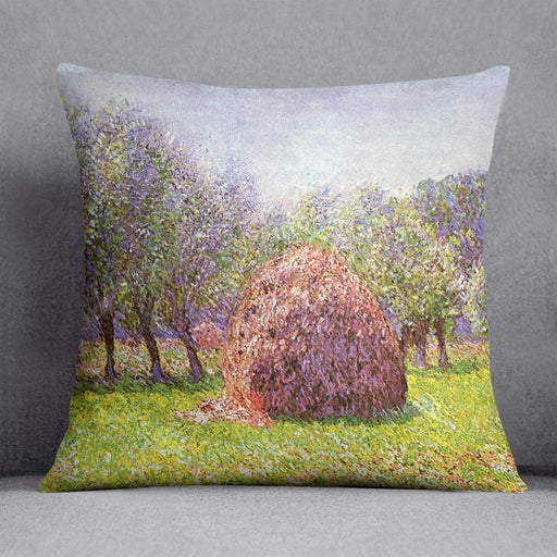 Heap of hay in the field by Monet Cushion
