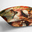 Two reading girls in a garden by Renoir Cushion
