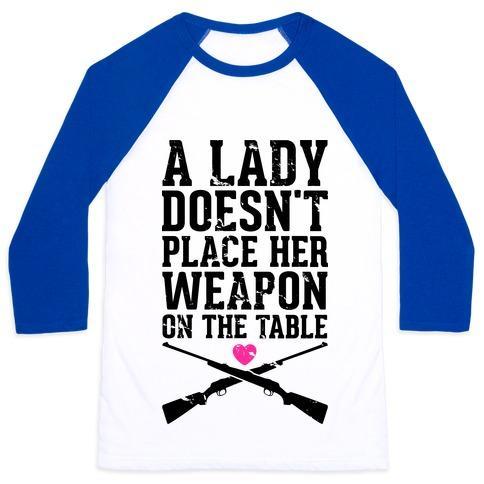Virgin Teez  Baseball Tee Unisex Classic Baseball Tee / x-small / White/Blue A LADY DOESN'T PLACE HER WEAPON ON THE TABLE UNISEX CLASSIC BASEBALL TEE