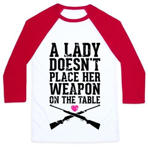 Virgin Teez  Baseball Tee Unisex Classic Baseball Tee / x-small / White/Red A LADY DOESN'T PLACE HER WEAPON ON THE TABLE UNISEX CLASSIC BASEBALL TEE