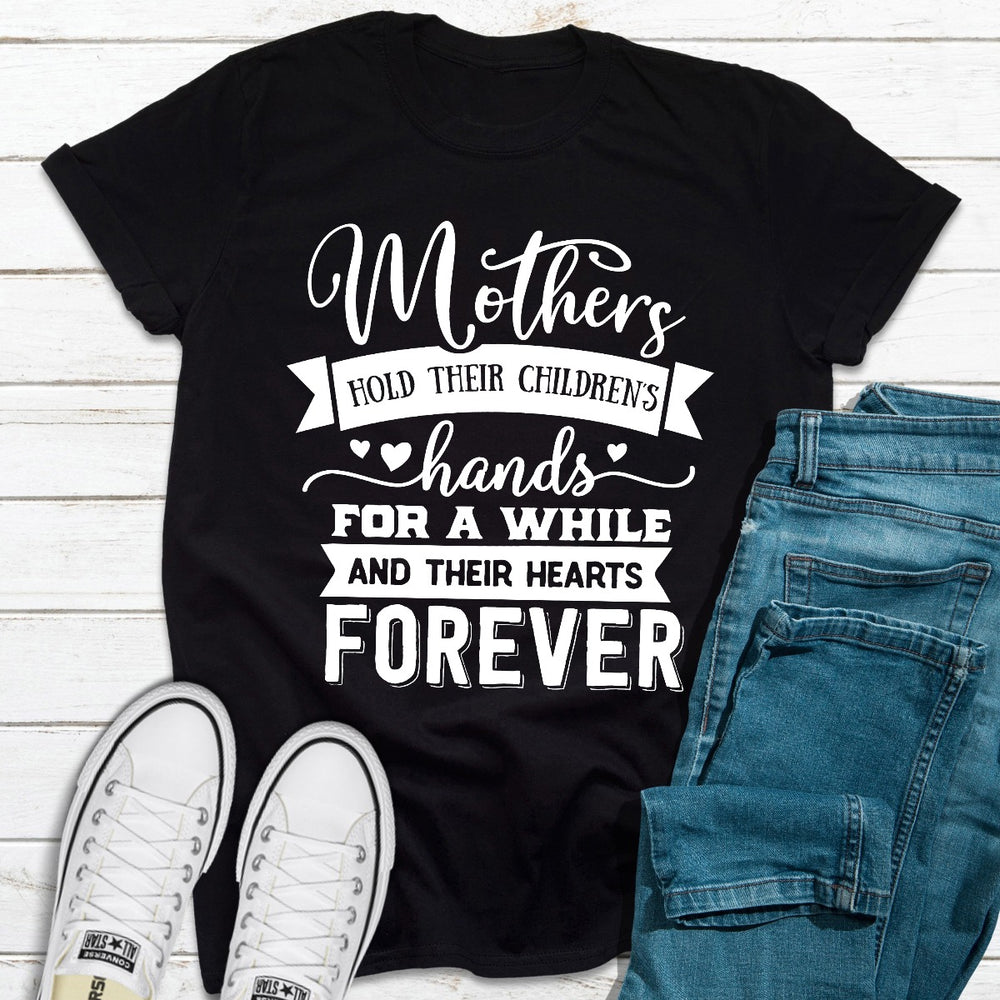 Mothers Hold Their Childrens Hands For A While