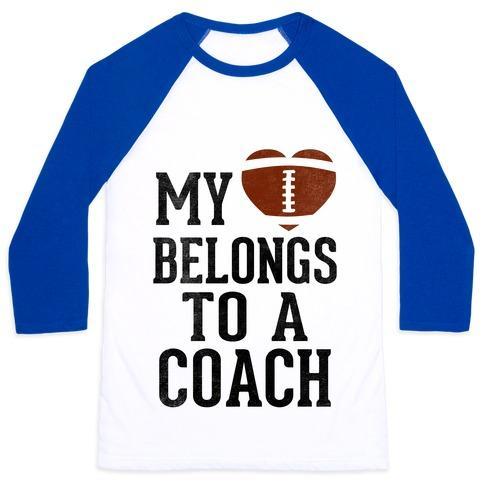 Virgin Teez  Baseball Tee Unisex Classic Baseball Tee / x-small / White/Blue MY HEART BELONGS TO A FOOTBALL COACH (BASEBALL TEE) UNISEX CLASSIC BASEBALL TEE