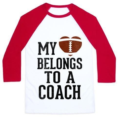 Virgin Teez  Baseball Tee Unisex Classic Baseball Tee / x-small / White/Red MY HEART BELONGS TO A FOOTBALL COACH (BASEBALL TEE) UNISEX CLASSIC BASEBALL TEE