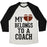 Virgin Teez  Baseball Tee Unisex Tri-Blend Baseball Tee / small / Oatmeal / Black MY HEART BELONGS TO A FOOTBALL COACH (BASEBALL TEE) UNISEX TRI-BLEND BASEBALL TEE