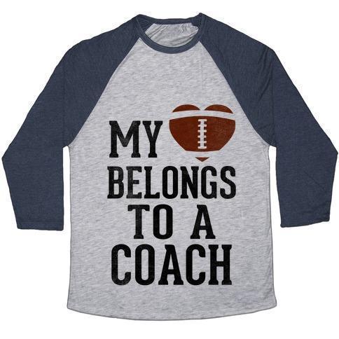 Virgin Teez  Baseball Tee Unisex Tri-Blend Baseball Tee / small / Athletic Gray / Navy MY HEART BELONGS TO A FOOTBALL COACH (BASEBALL TEE) UNISEX TRI-BLEND BASEBALL TEE