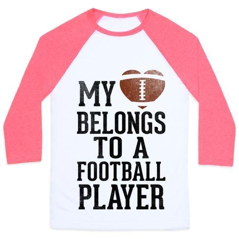 Virgin Teez  Baseball Tee Unisex Classic Baseball Tee / x-small / White/Neon Pink MY HEART BELONGS TO A FOOTBALL PLAYER (BASEBALL TEE) UNISEX CLASSIC BASEBALL TEE