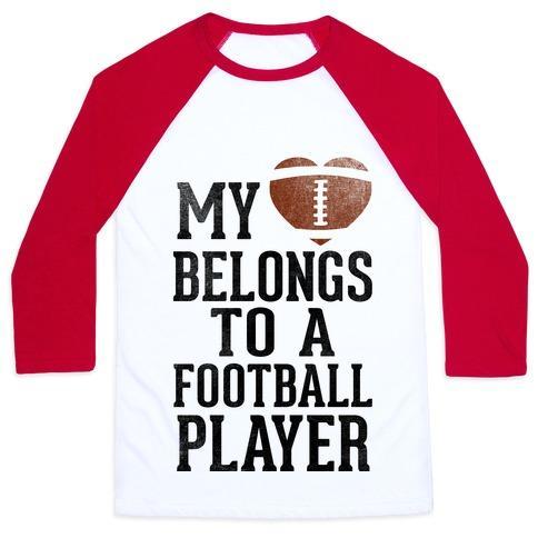 Virgin Teez  Baseball Tee Unisex Classic Baseball Tee / x-small / White/Red MY HEART BELONGS TO A FOOTBALL PLAYER (BASEBALL TEE) UNISEX CLASSIC BASEBALL TEE