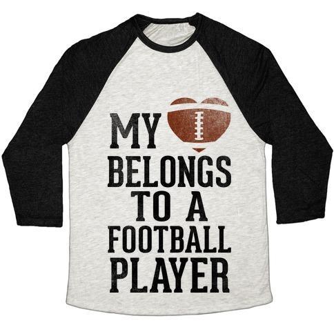 Virgin Teez  Baseball Tee Unisex Tri-Blend Baseball Tee / small / Oatmeal / Black MY HEART BELONGS TO A FOOTBALL PLAYER (BASEBALL TEE) UNISEX TRI-BLEND BASEBALL TEE