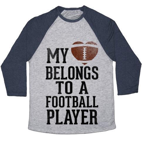 Virgin Teez  Baseball Tee Unisex Tri-Blend Baseball Tee / small / Athletic Gray / Navy MY HEART BELONGS TO A FOOTBALL PLAYER (BASEBALL TEE) UNISEX TRI-BLEND BASEBALL TEE