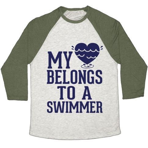Virgin Teez  Baseball Tee Unisex Tri-Blend Baseball Tee / small / Oatmeal / Moss MY HEART BELONGS TO A SWIMMER UNISEX TRI-BLEND BASEBALL TEE