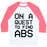 Virgin Teez  Baseball Tee Unisex Classic Baseball Tee / x-small / White/Neon Pink ON A QUEST TO FIND ABS UNISEX CLASSIC BASEBALL TEE